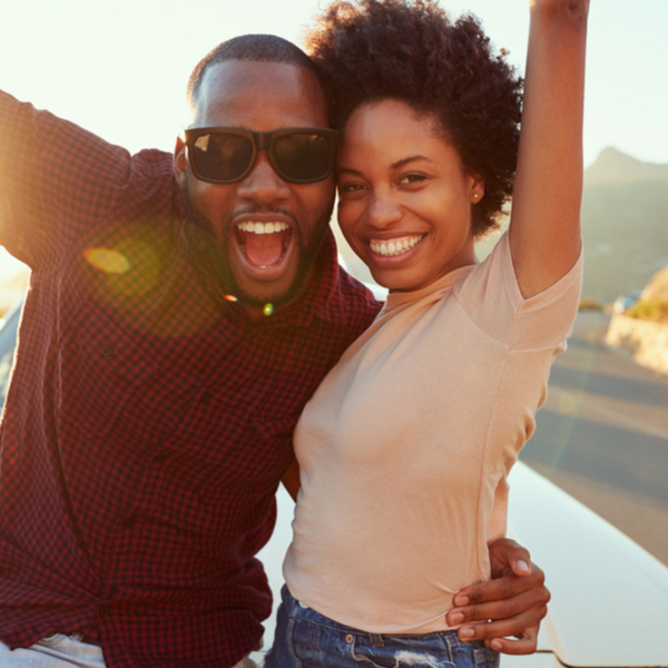 General Dentistry Young Couple Outdoors with Sunglasses
