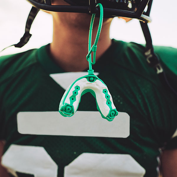 Mouthguards Young Man Wearing an Athletic Mouthguard